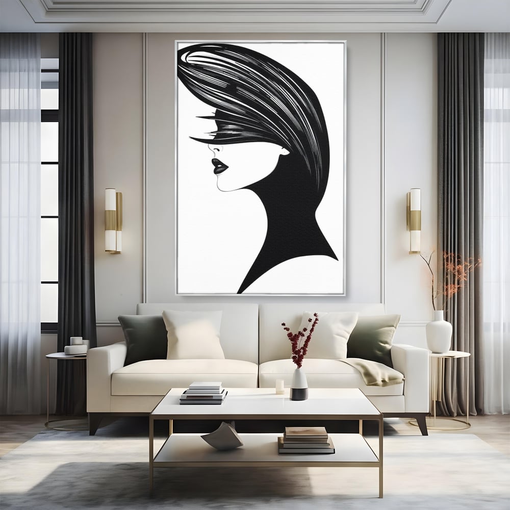 Tablou canvas cu ilustratie cu profil de femeie in alb si negru, in rama de aluminiu argintiu, pe perete intr-un living
